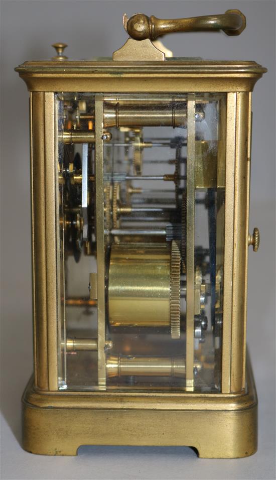 A French brass cased eight day repeating carriage clock, 4.75in ex. handle.